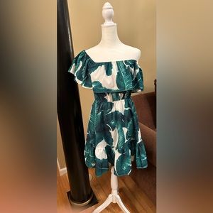 Dress by BMMGC  white background with green leaves size medium